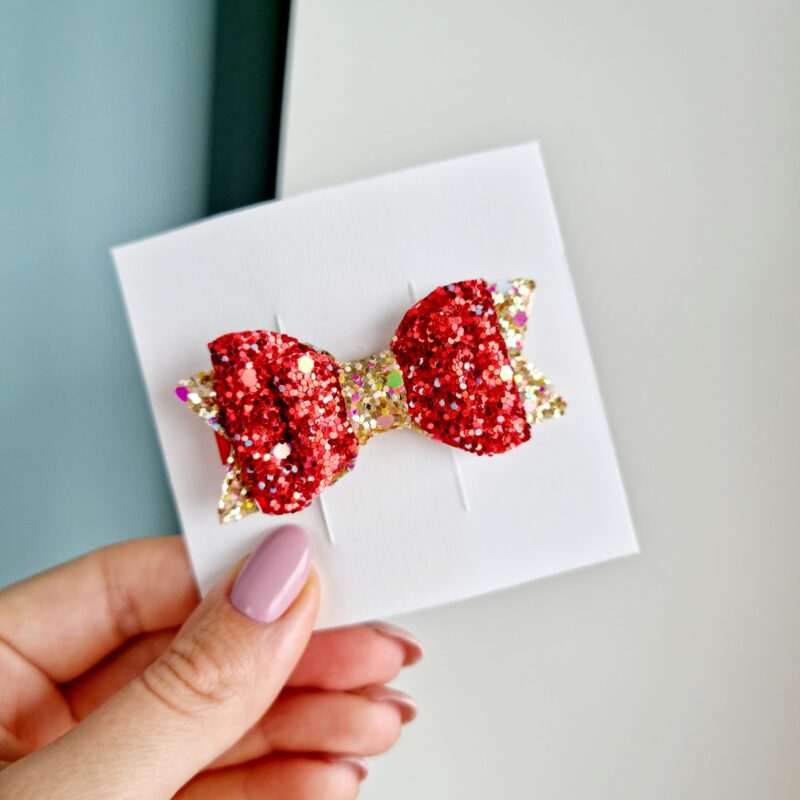 Kroko-klamber punane kuldsega