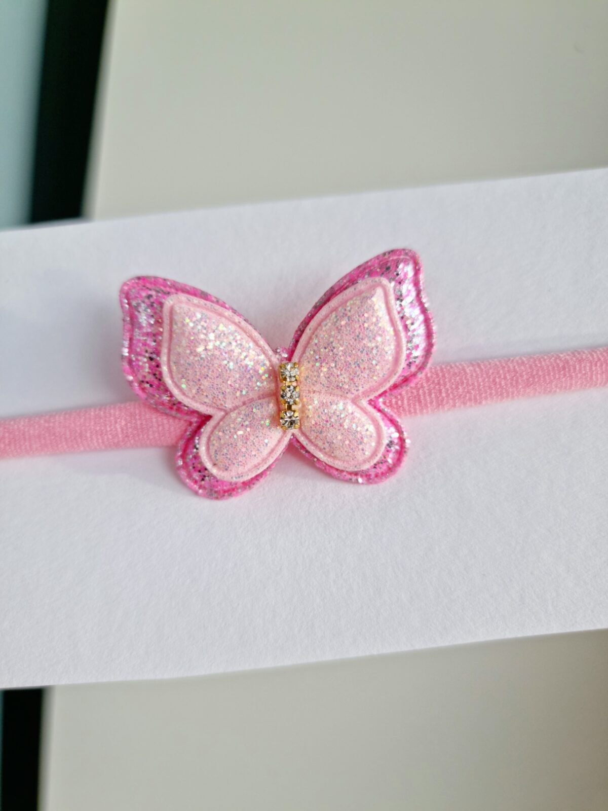 20211126_131012 Läikiv liblikas roosa