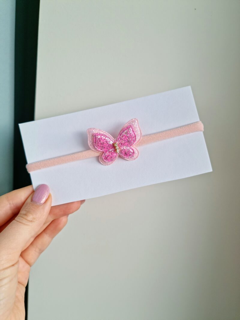 Läikiv liblikas roosakas