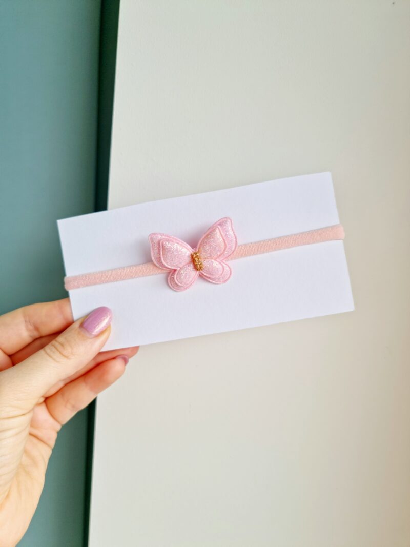 Läikiv liblikas heleroosa