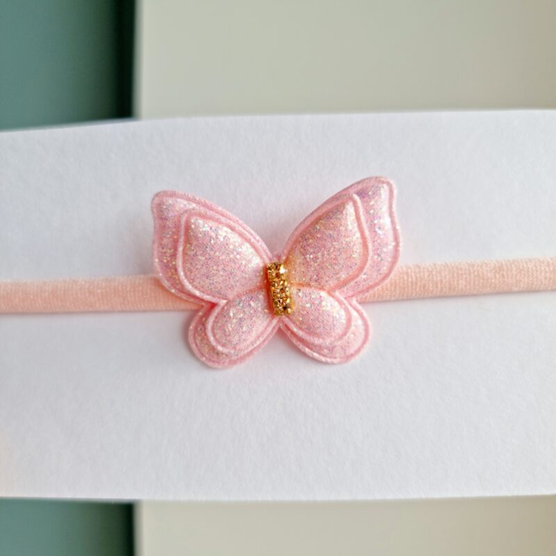 Läikiv liblikas heleroosa