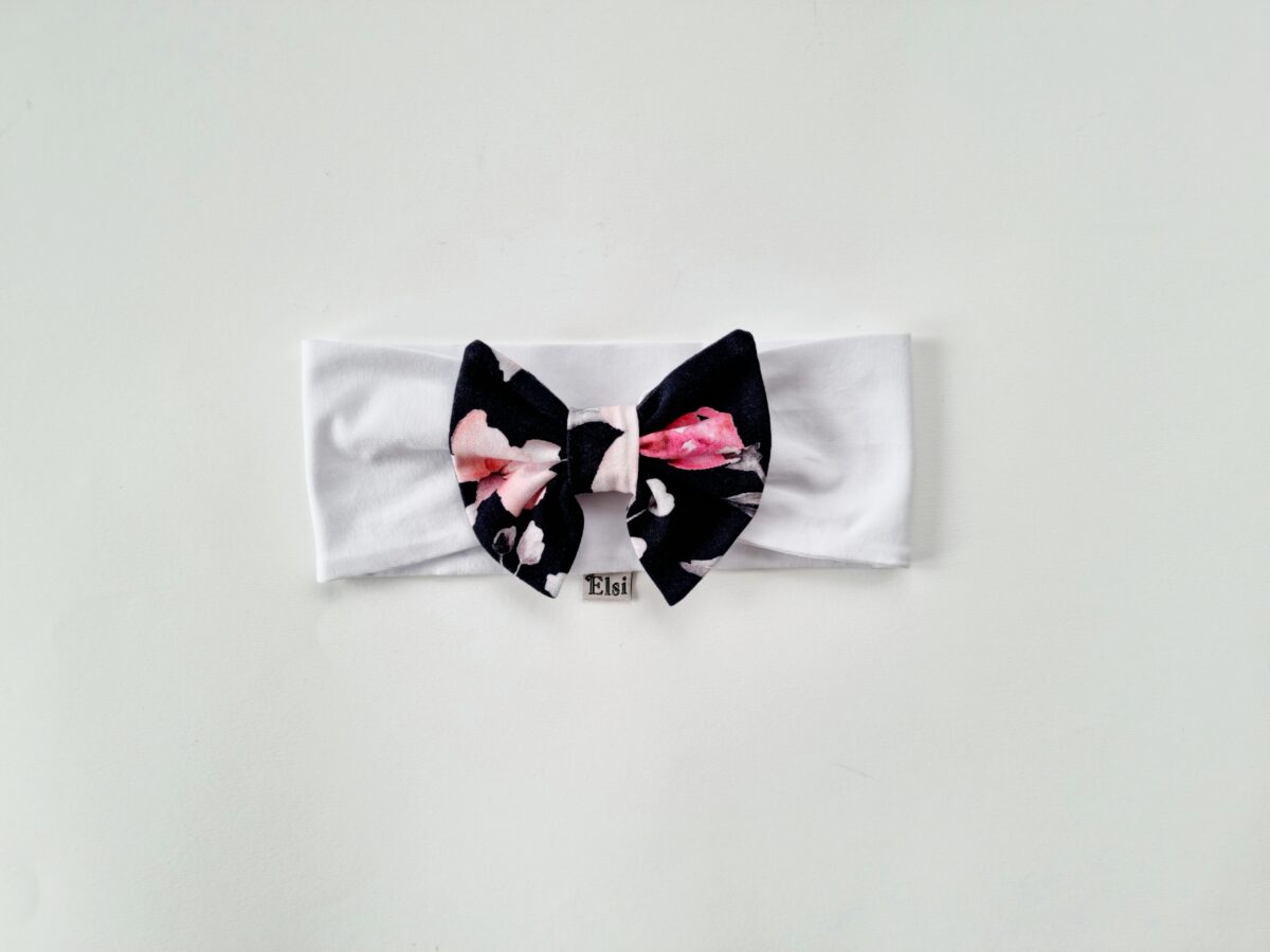 Valge peapael mustal roosidega