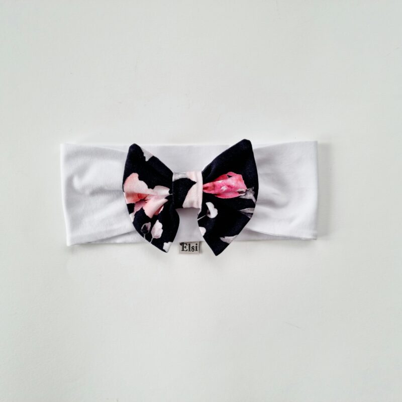 20211213_113227 Valge peapael mustal roosidega