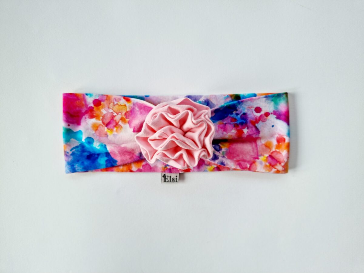 Värviline peapael heleroosa lillega