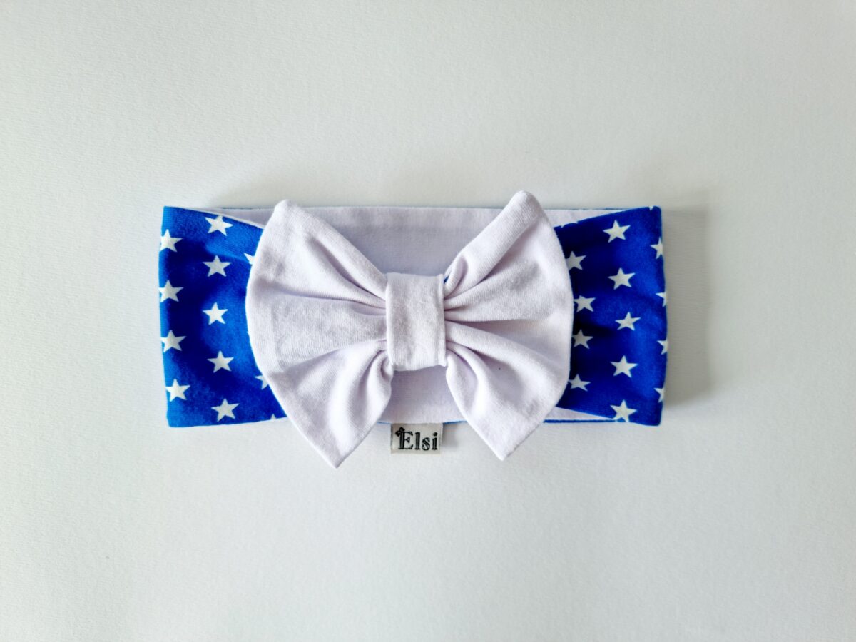 20220324_114150 Tähekestega peapael valge lipsuga