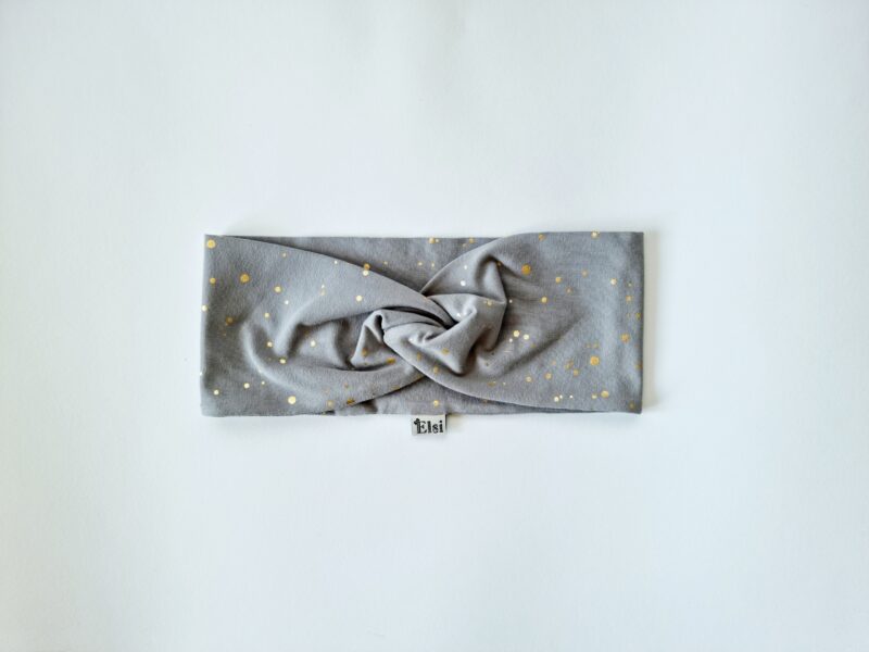 Hallil kuldsed täpid