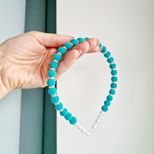 Pärlitega peavõru münt