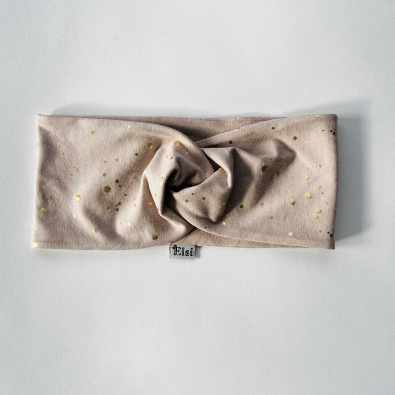 Beež kuldsete täppidega