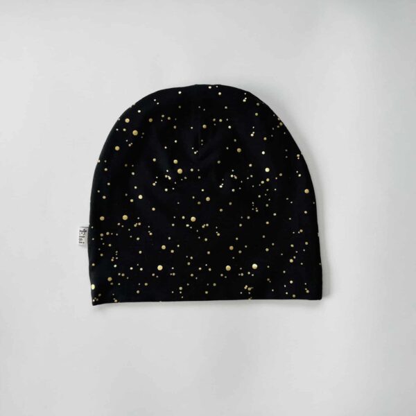 Mustal kuldsed täpid