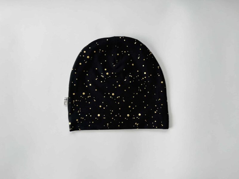 Mustal kuldsed täpid