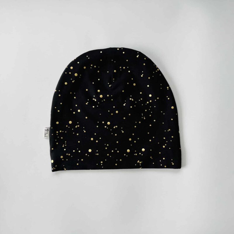 Mustal kuldsed täpid