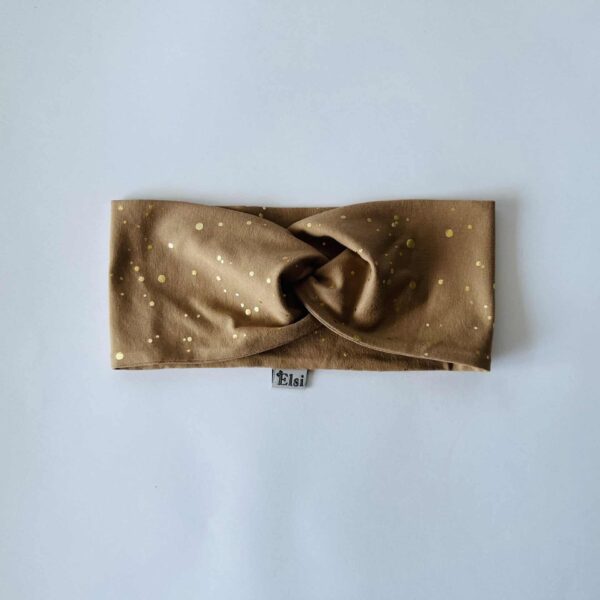 Sinepil kuldsed täpid