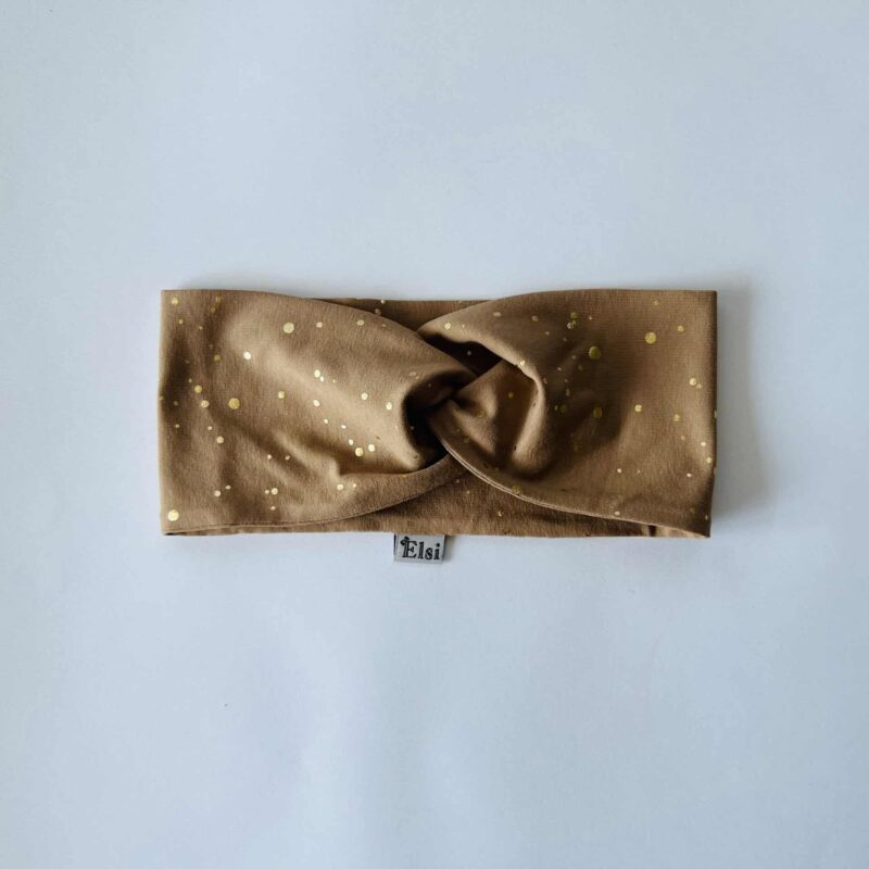 Sinepil kuldsed täpid