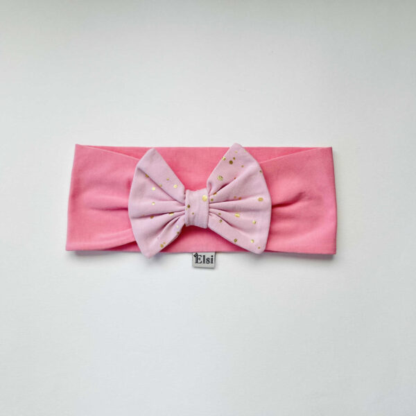 Roosa peapael roosal kuldsed täpid