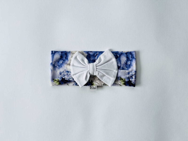 Sirelililla peapael valge lipsuga