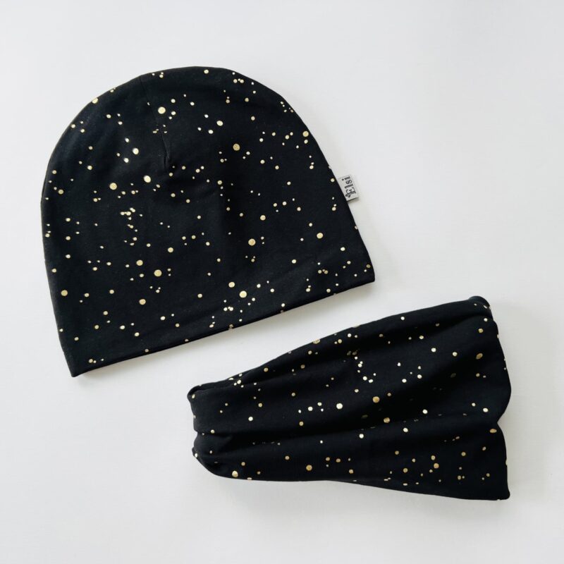 Mustal kuldsed täpid