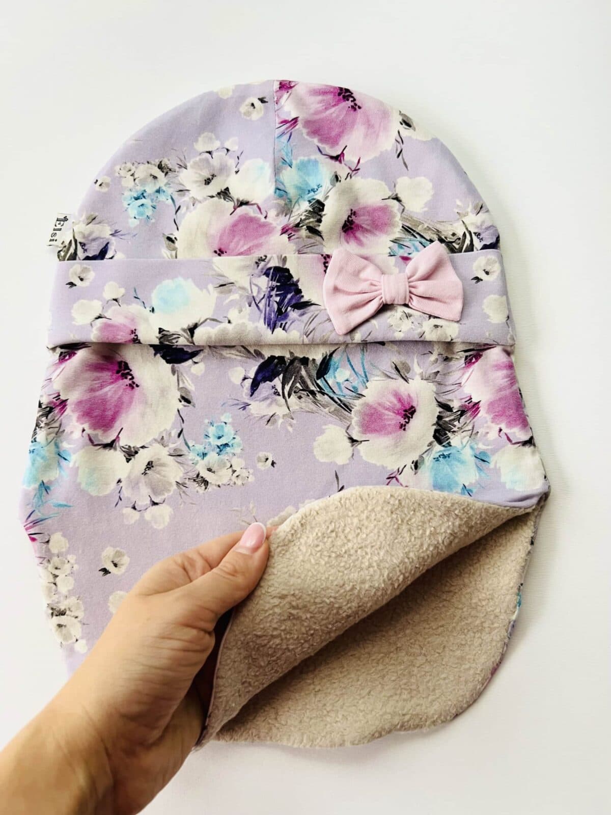 Sirelilillad lilled lipsuga (fliisvooder)