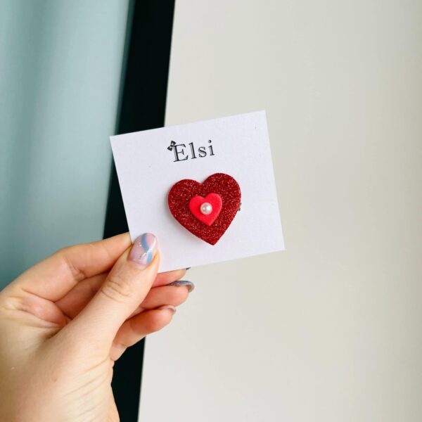 Punane süda pärliga