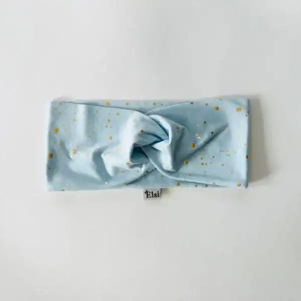 Helesinisel kuldsed täpid