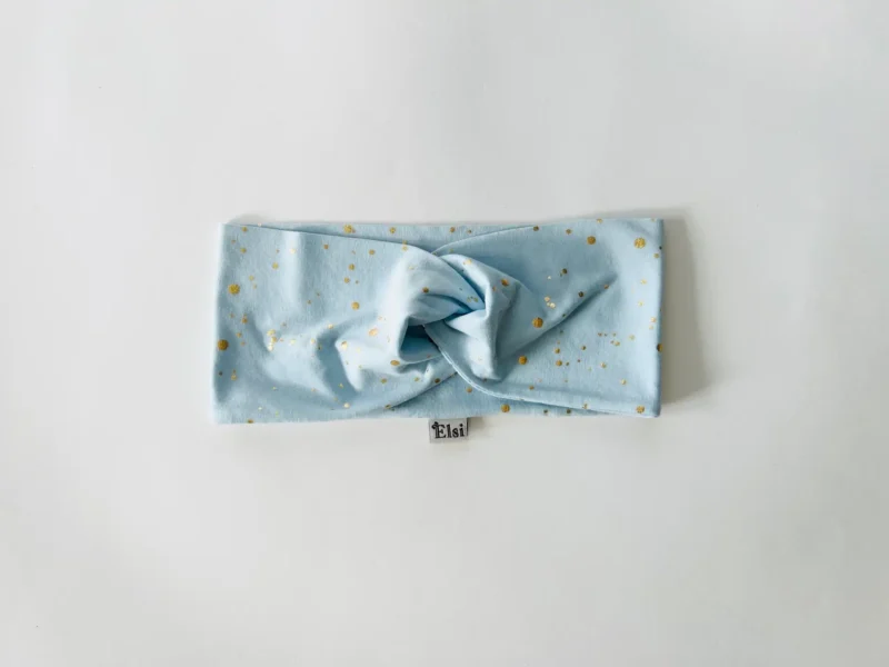 Helesinisel kuldsed täpid