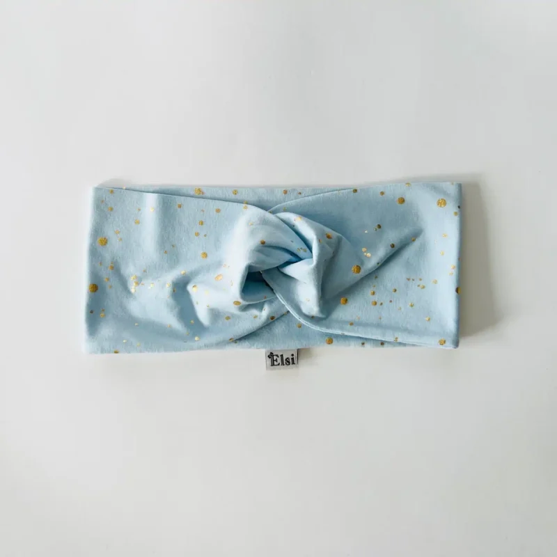 Helesinisel kuldsed täpid