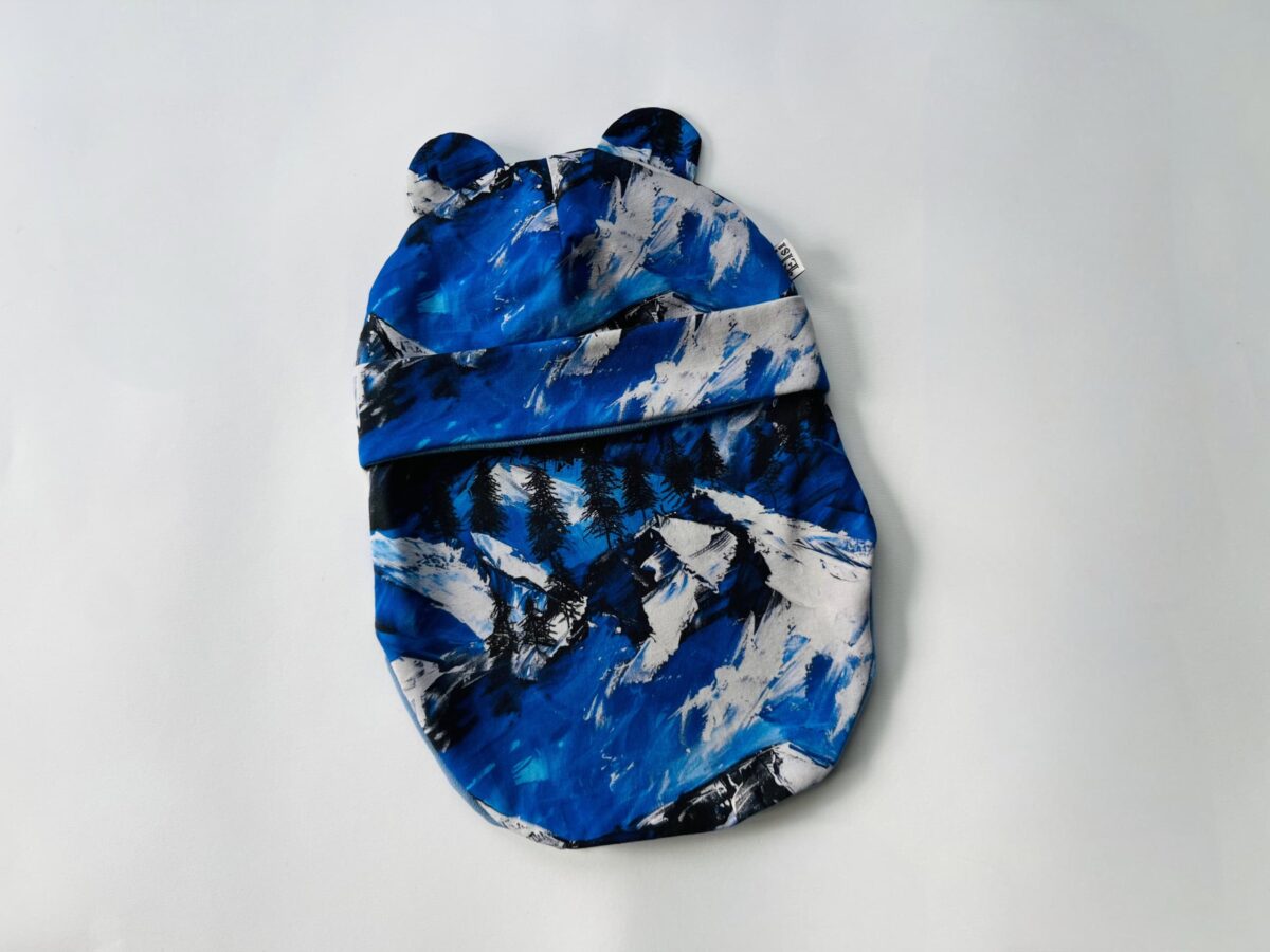 Meriinovoodriga tuukrimüts kõrvadega