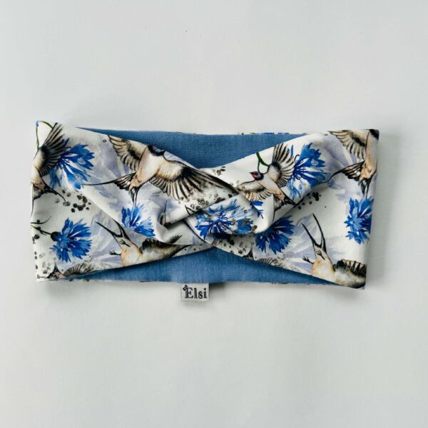 Meriinopeapael pääsukesed ja rukkililled