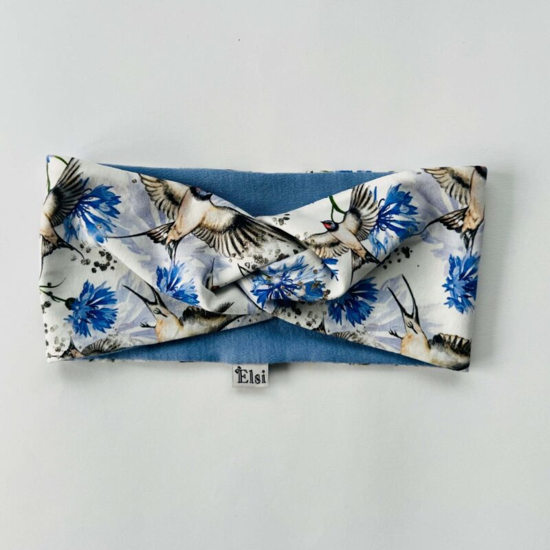 Meriinopeapael pääsukesed ja rukkililled